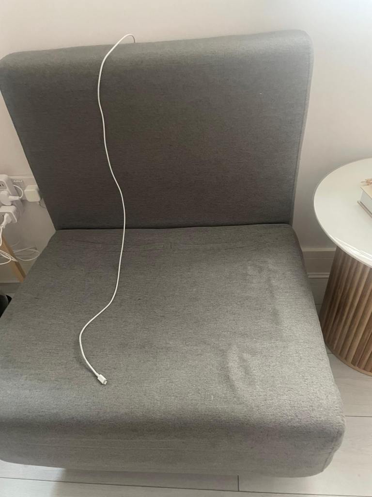 Grey Fabric Armless Chair – Good Condition