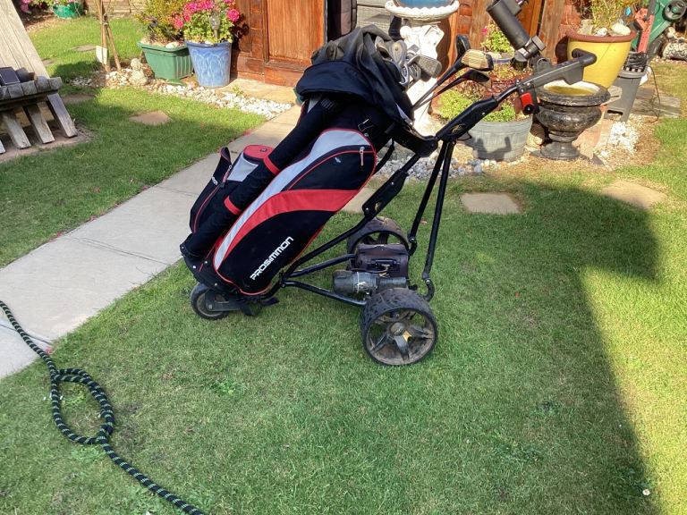 Full set of clubs + bag x balls and tees Electric trolley £125. see photos .