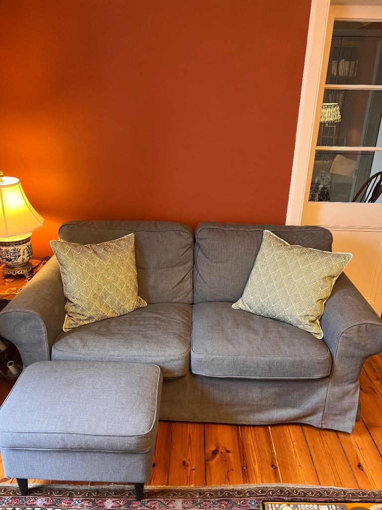 2 seater navy IKEA sofa with footstool