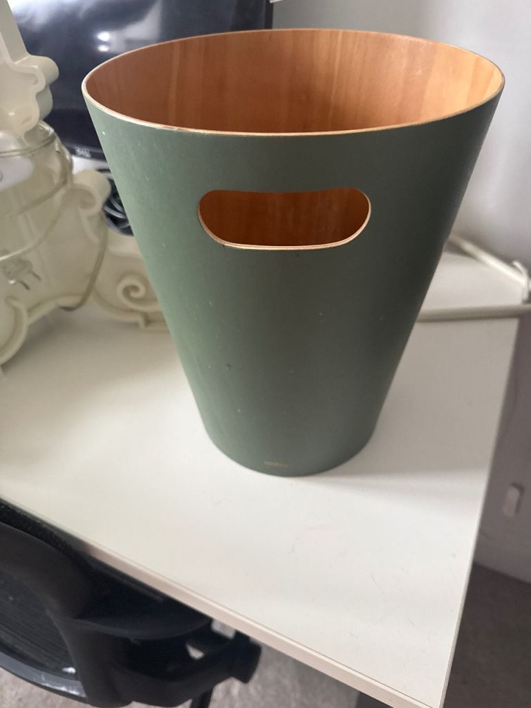 Umbra waste paper basket by Henry Huang 