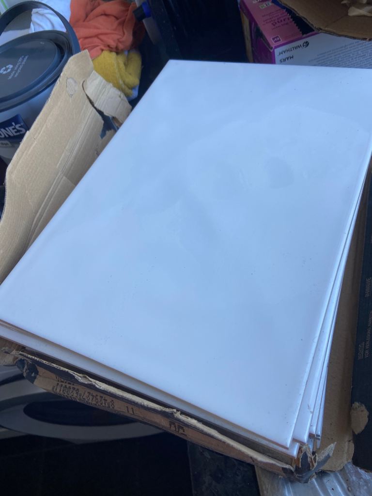 14 white ceramic tiles