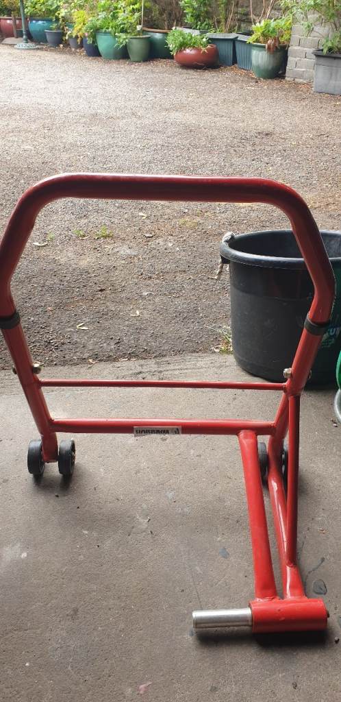 Warrior L/H single sided rear paddock stand. Pin A 27.4 diameter.