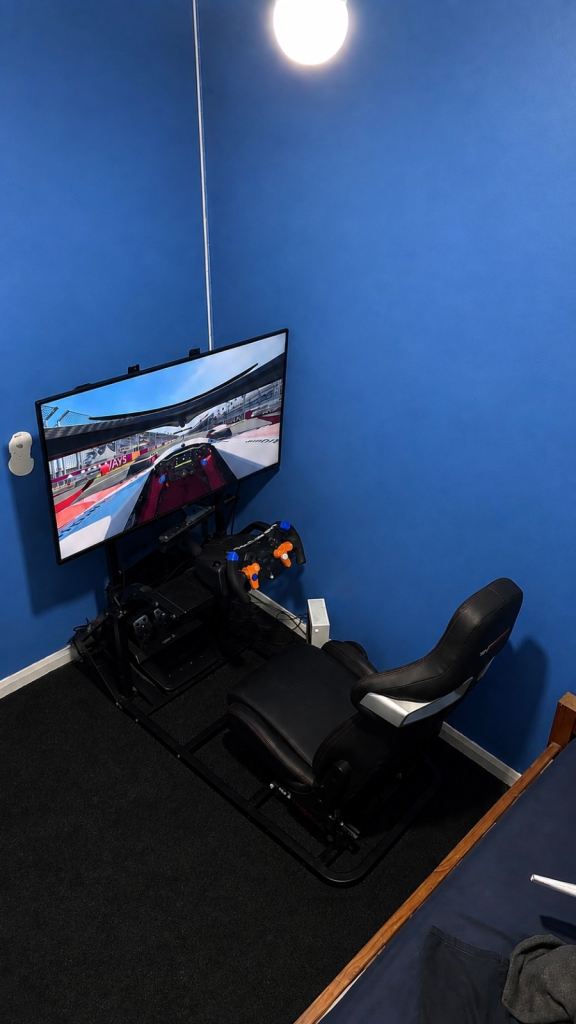 F1 racing sim, Logitech Racing Wheel, Pedals, and GT Omega Racing Seat for Xbox 1