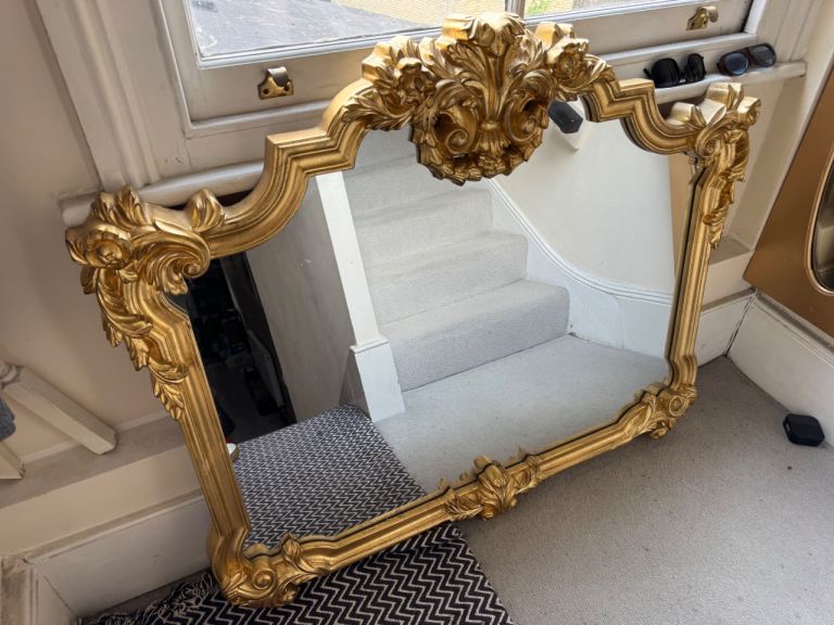 Large gold ornate mirror