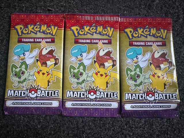 pokemon card game match TCG: 2023 McDonalds Happy Meal Battle Booster Pack  TBC Games Each paper booster pack contains 4 random promotional cards (1 holofoil Pokemon 2022 McDonalds Happy Meal