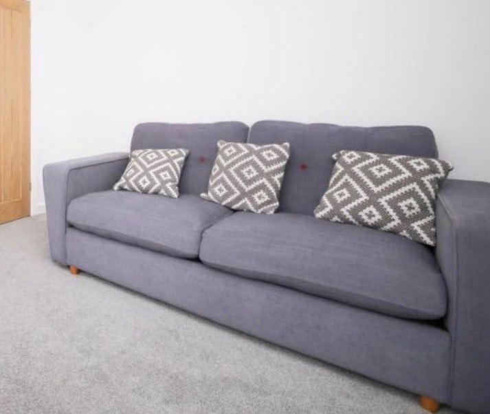 Comfy Grey Fabric Sofa Bed with Cushions – Good Condition