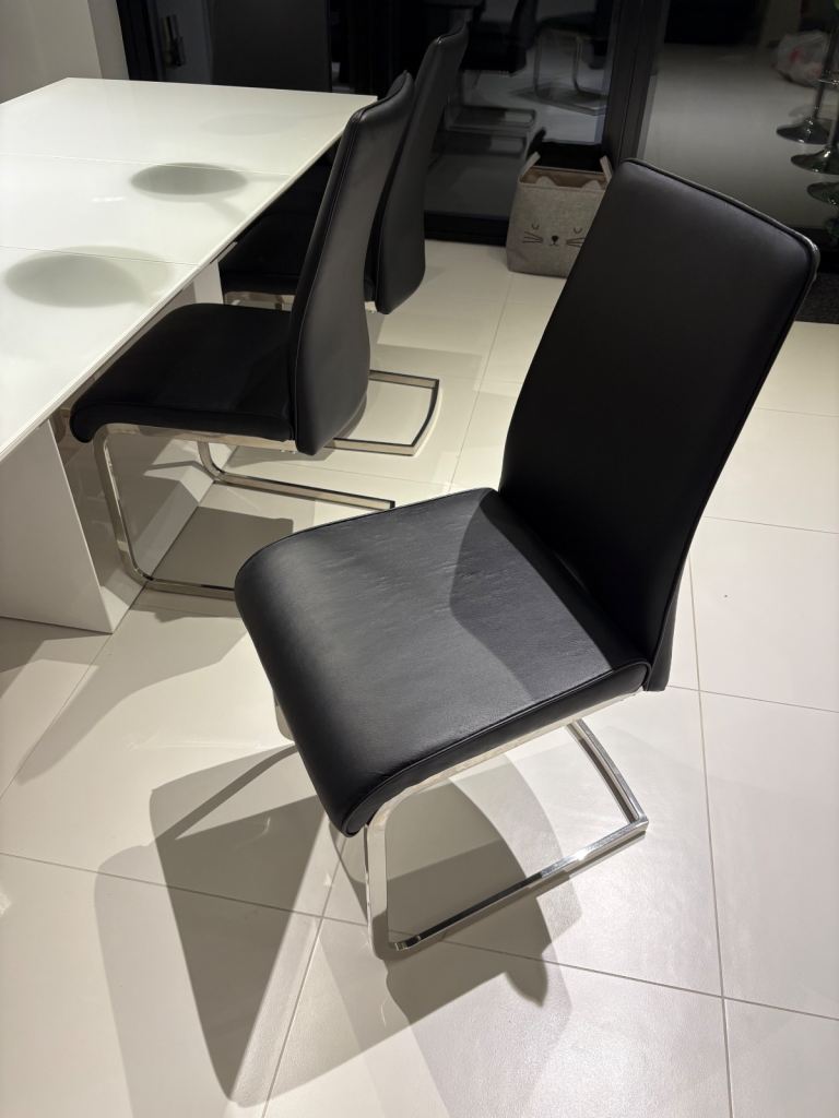 White glass dining table and 6 or 8 chairs