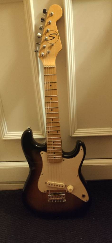 Samick 1/2 size electric guitar and amp For 5 to 8 year olds.
