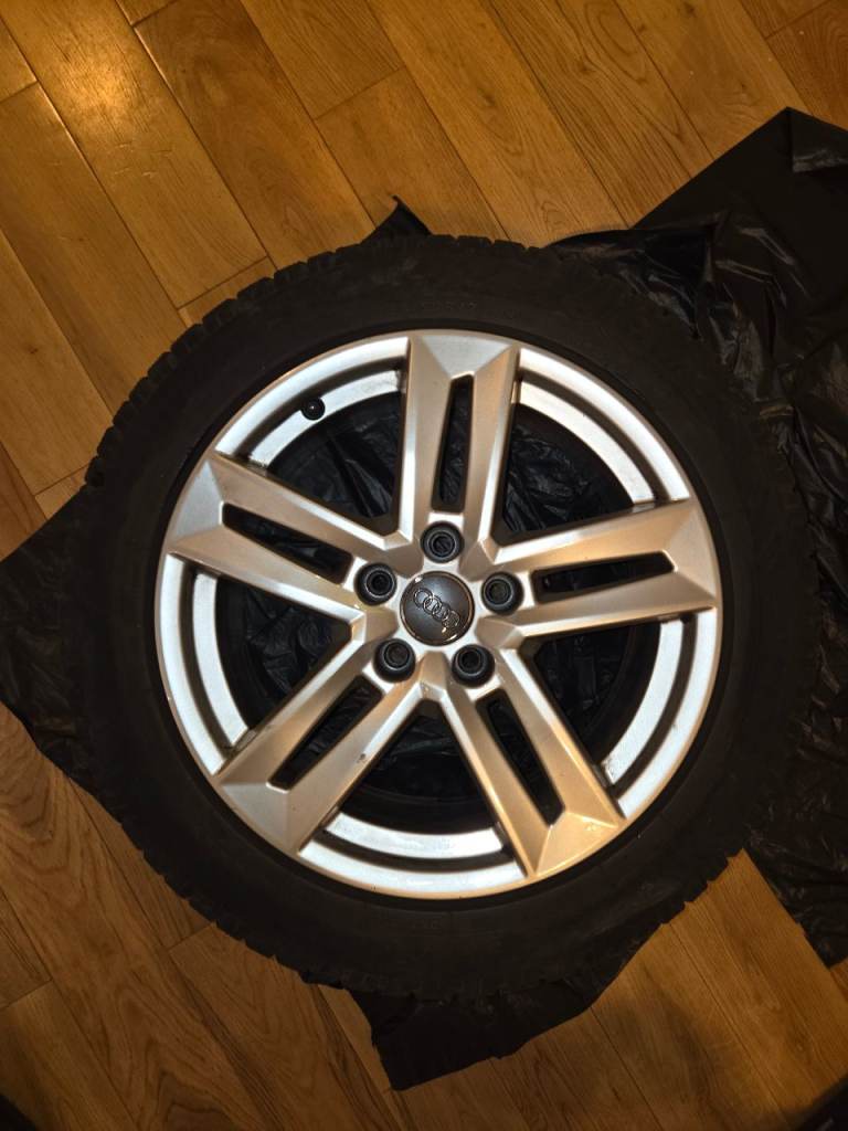 A set of original Audi 4 alloy wheels