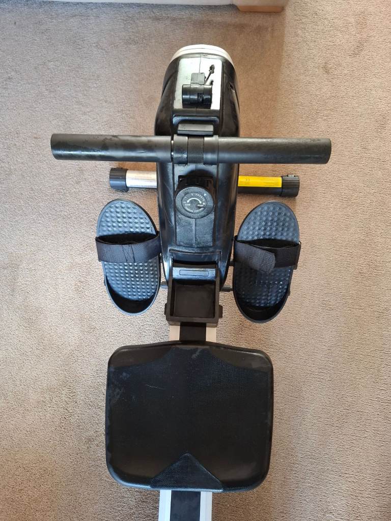 Opti magnetic rowing machine