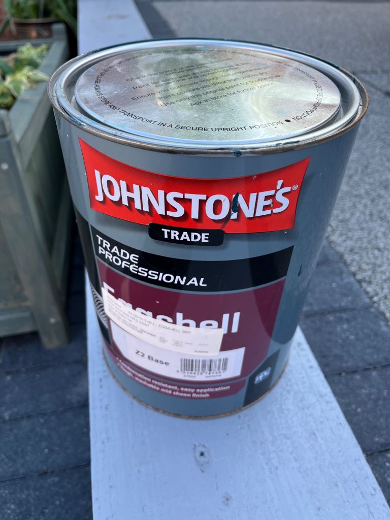 Tin of Johnstones trade paint in blue