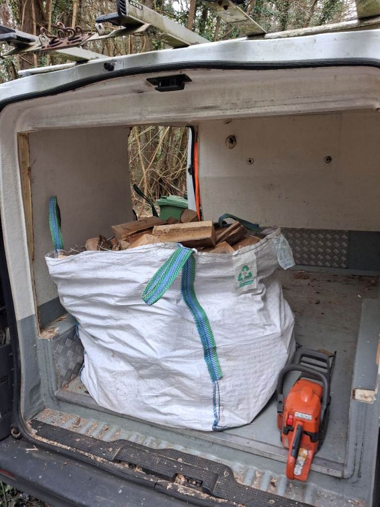 Seasoned hardwood logs with free delivery 1ton builders bag £60 2 bags £110 4 bags £180
