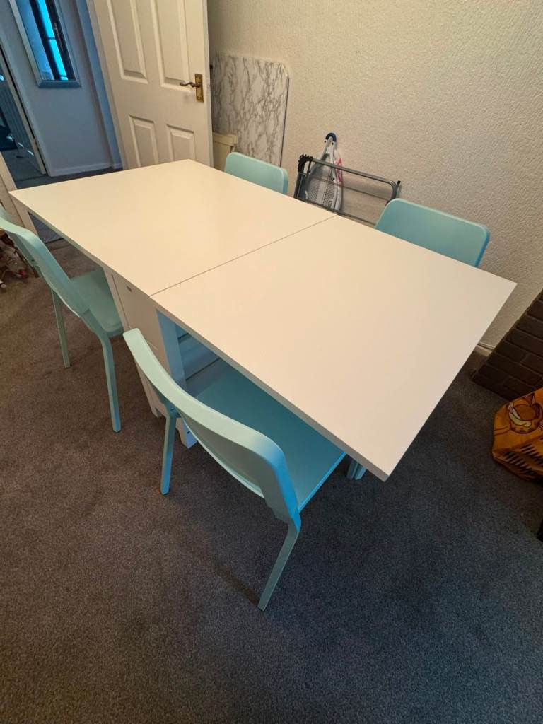 White Extendable Dining Table with 4 Light Blue Chairs