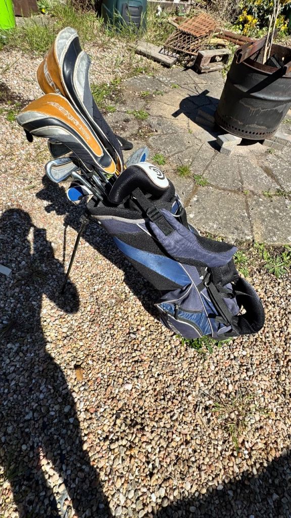 **FREE** Junior golf clubs and bag. 