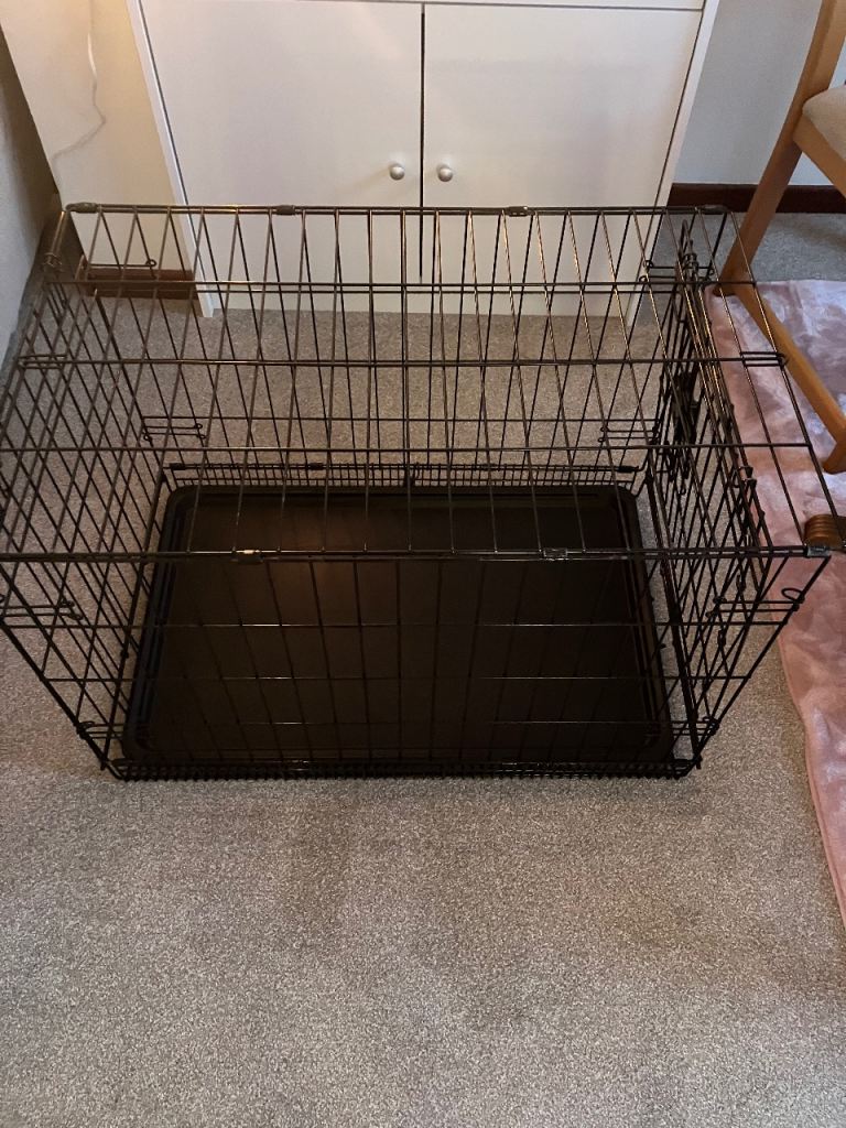 2 medium dog crates 