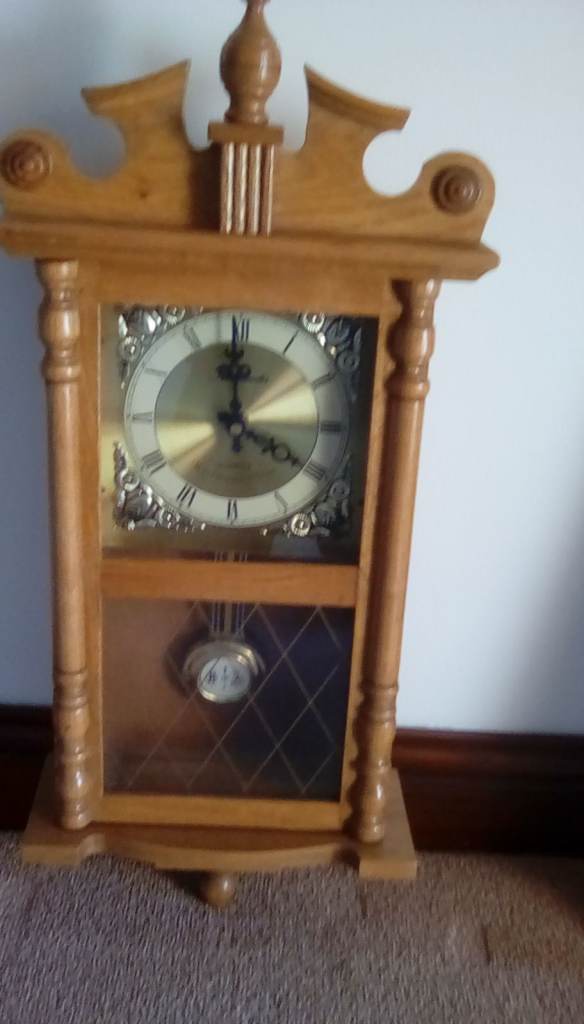 Wooden chiming wall clock