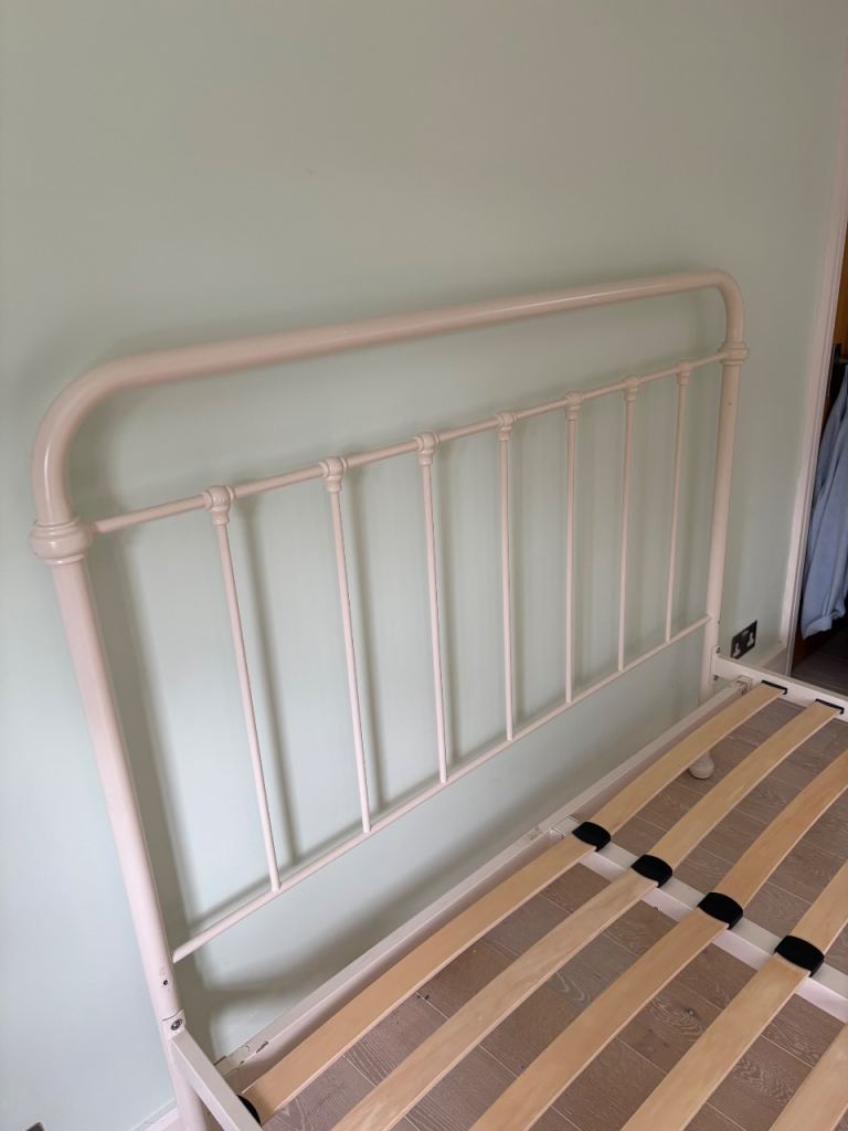 Feather and Black bed frame