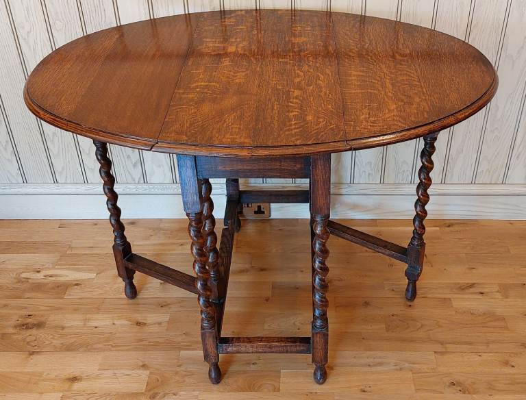 Elegant & versatile antique oak barley twist oval gate leg drop leaf table; very good condition