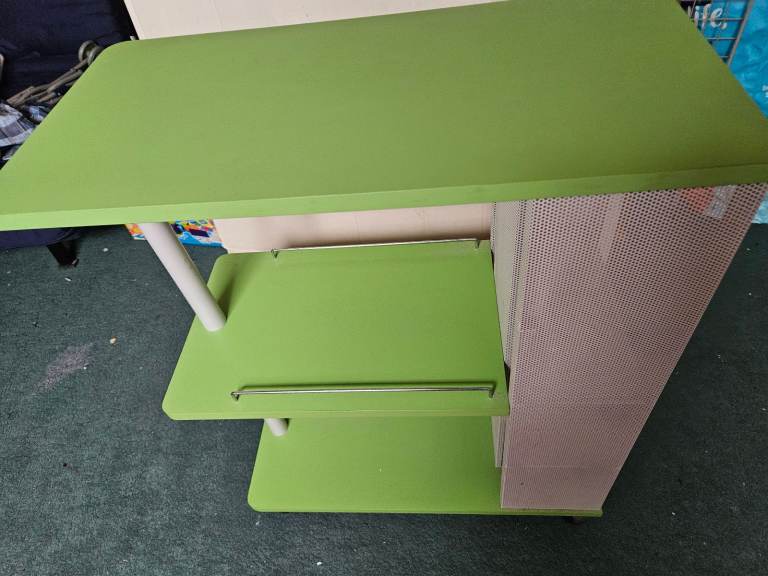 Green storage unit on wheels
