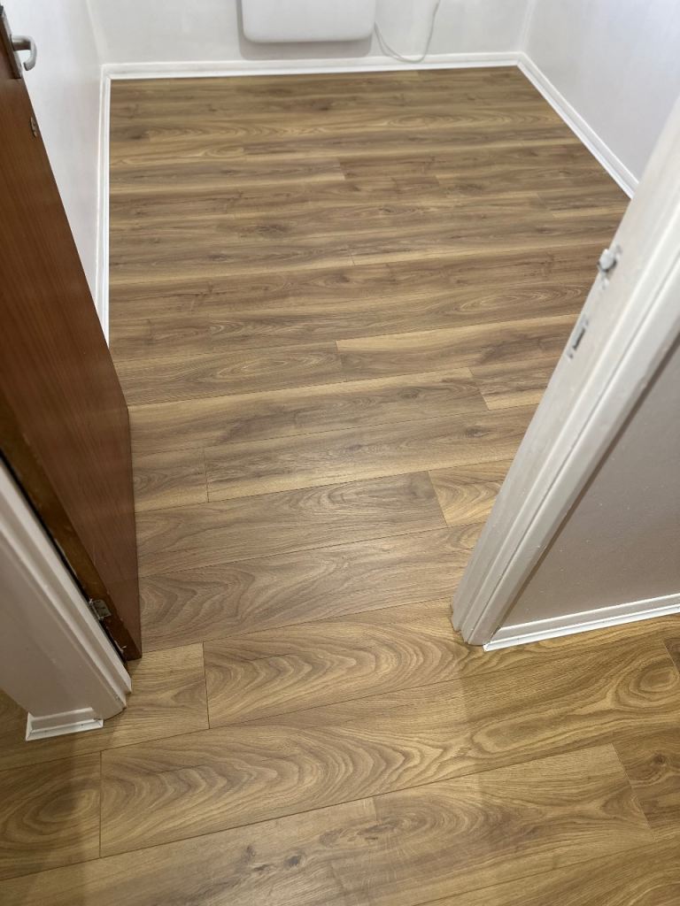 Laminate Herringbone Vinyl Flooring Fitter/ Installation - Handyman Painter Wallpaper 