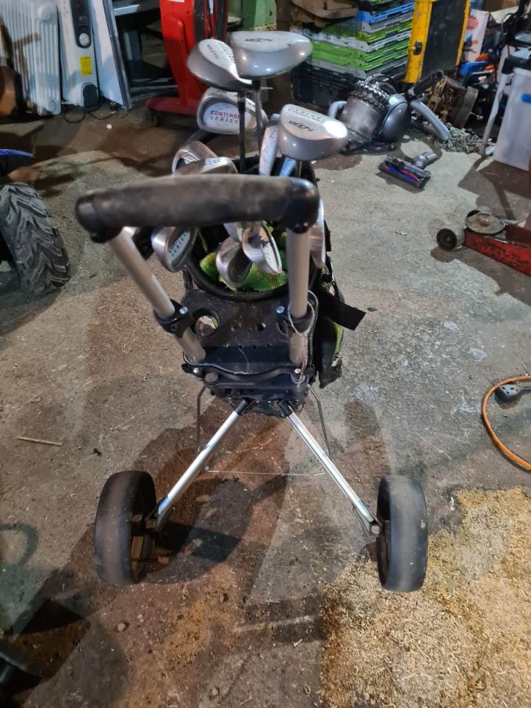 Golf bags/clubs on trolley