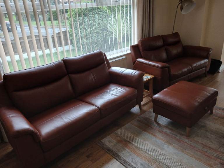 2 leather sofas and footstool 