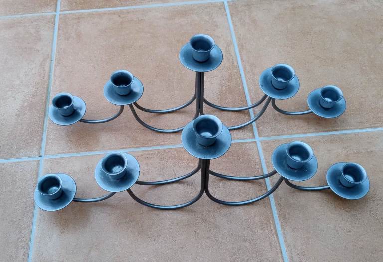 Pair of 5 candle sticks holders. 17 1/2 inches x 6 1/2 inches 