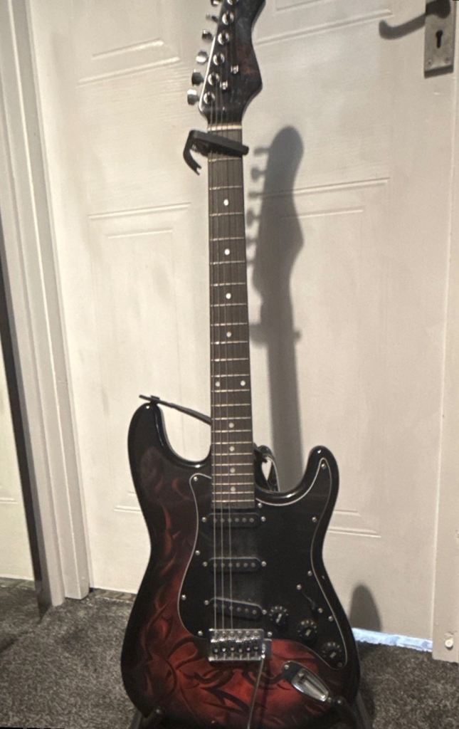 Jaxville Electric Guitar + MG10 Amplifier Picks and Stand