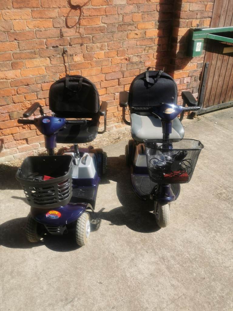Two kymco mobility scooter 