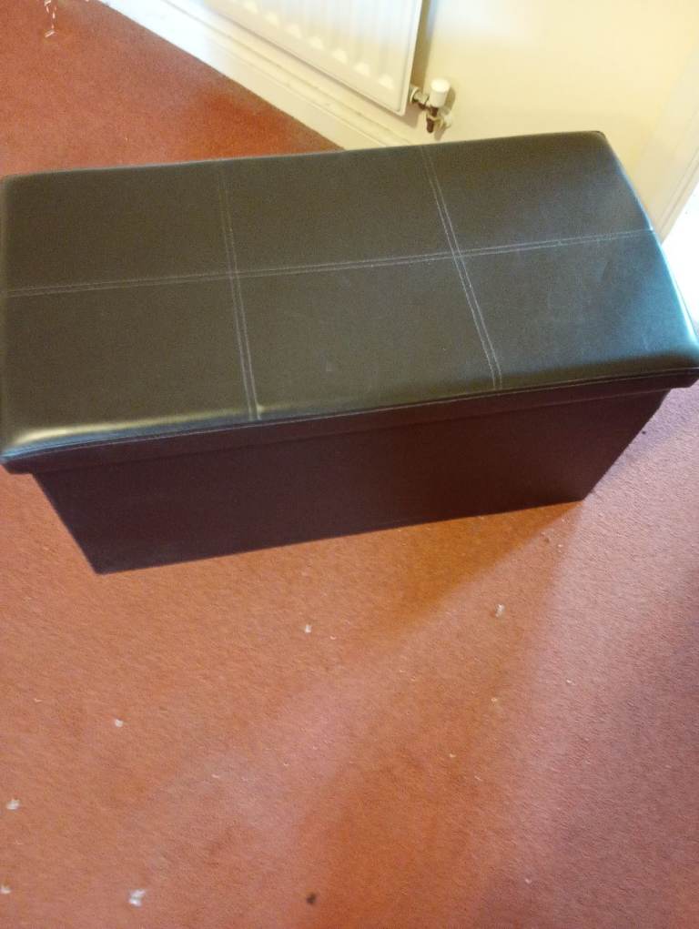 Free.....faux leather storage ottoman 