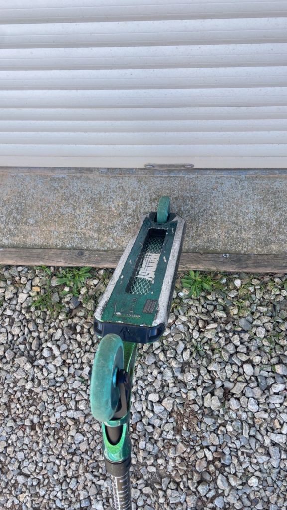 Prodigy scooter with core wheels and custom grips 
