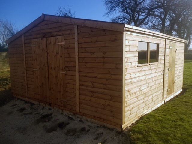 TIMBER GARAGE/WORKSHOP/HEAVY DUTY ERECTED FOR FREE