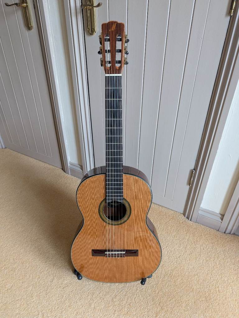 Classical guitar, hard case, stand & foot rest