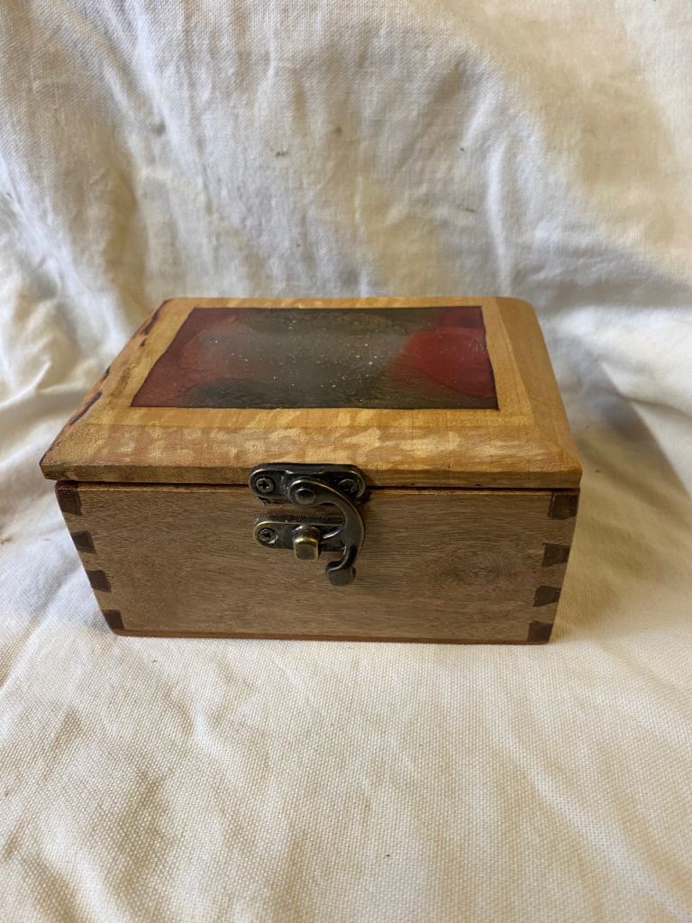 Unique small wooden handcrafted with resin inlay lid box.