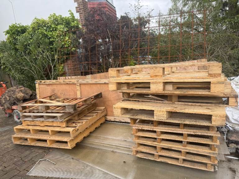 15 used wooden pallets