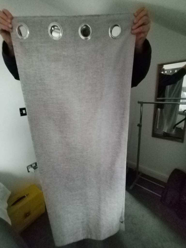 Pair of  light grey curtains 