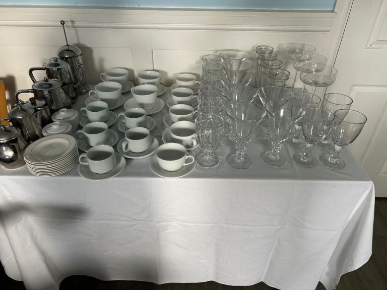 Cups saucers desserts dishes plates lots more items from a restaurant 