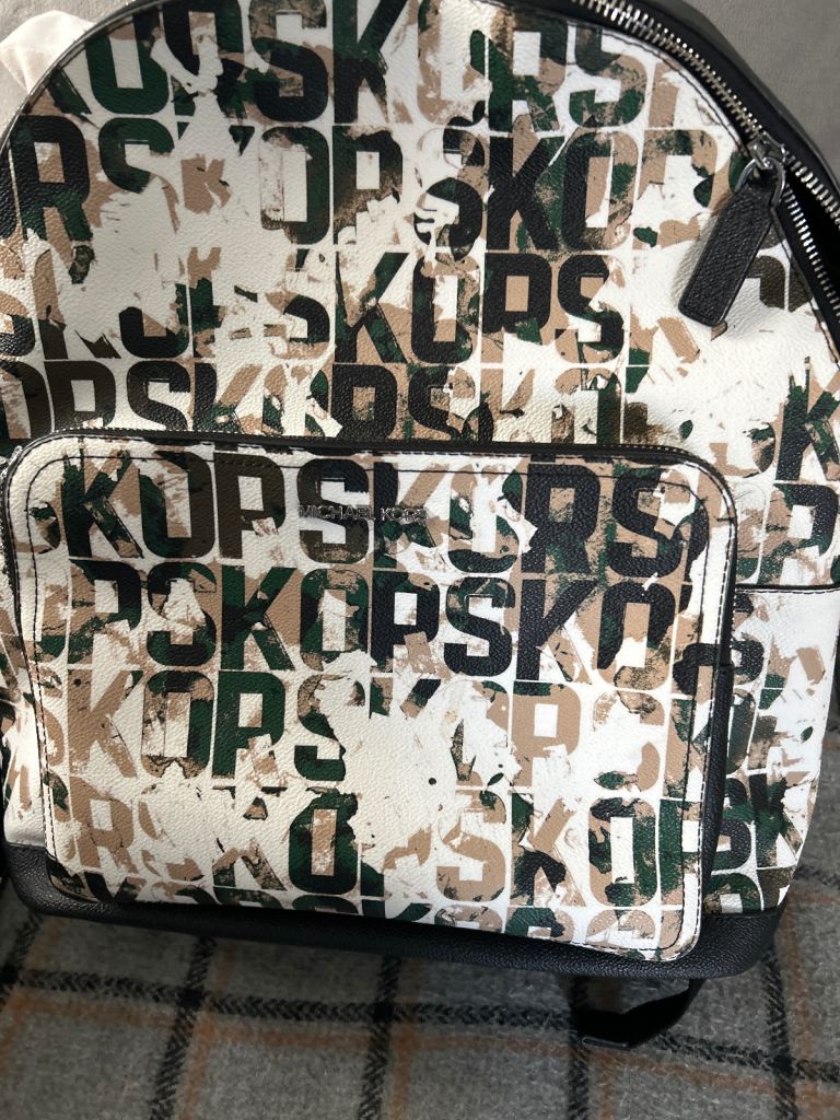 Michael Kors backpack, gold and black