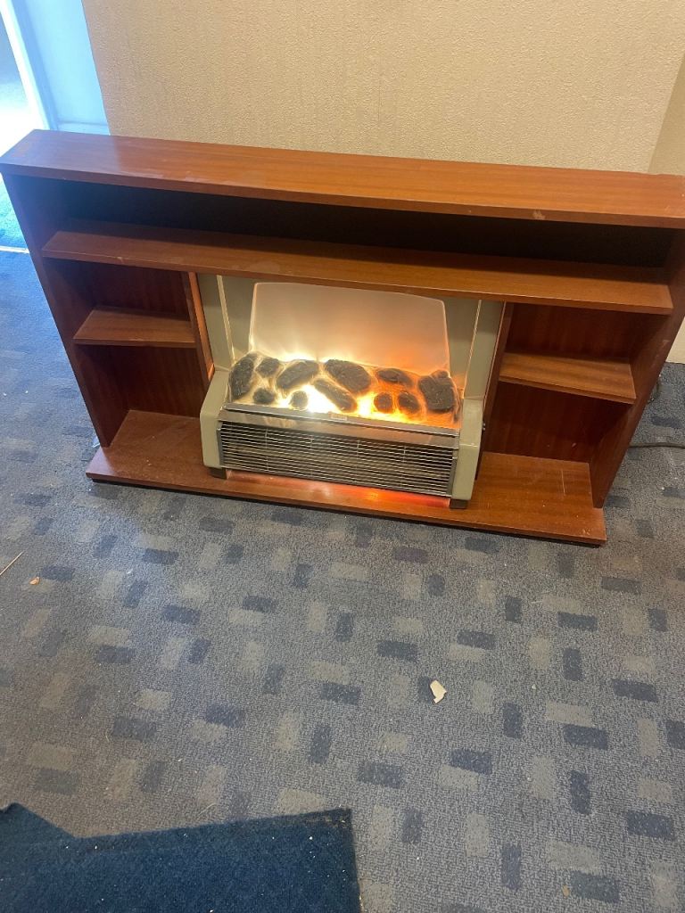 Vintage electric fire teak surround