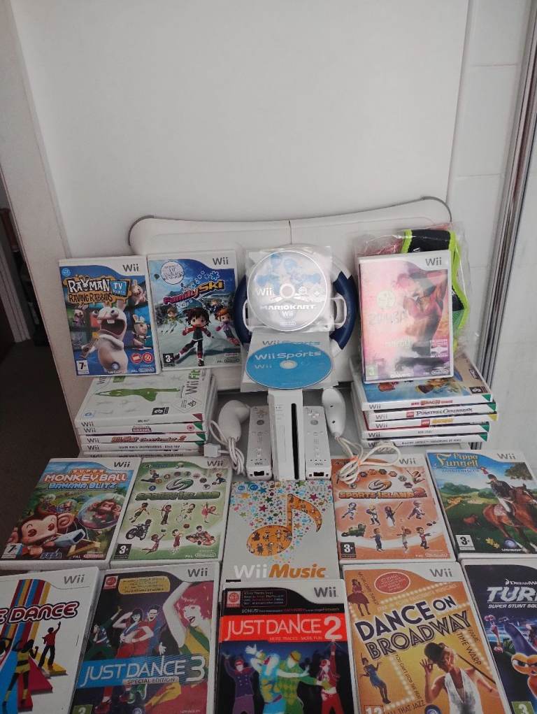 Nintendo Wii Console With 26 Games Wii Balance Board And Accessories In Good Condition £100