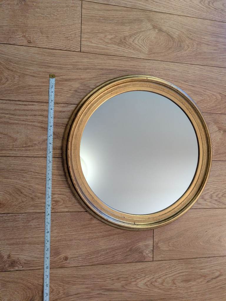 Gold rimmed mirror