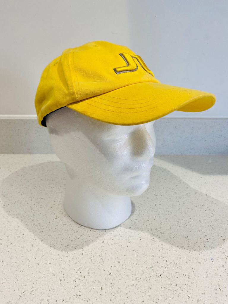 * NEW / UNUSED * J.LINDEBERG GOLF CAP. Yellow.  Size LARGE.