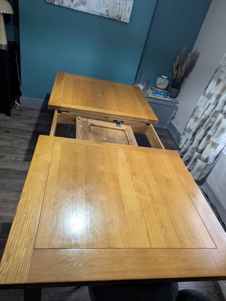 Solid wood extendable dining table - used with a few marks , £40.00 for ...