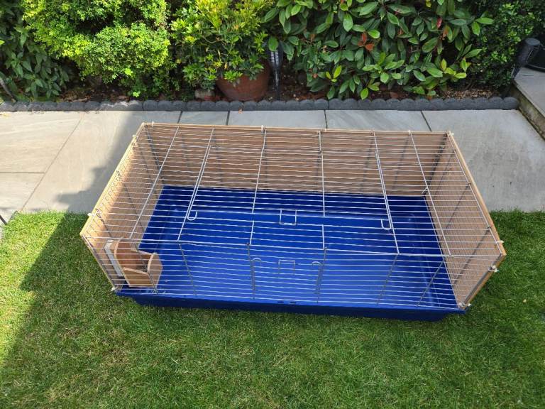 Indoor Cage with attached Wooden drink holder 
