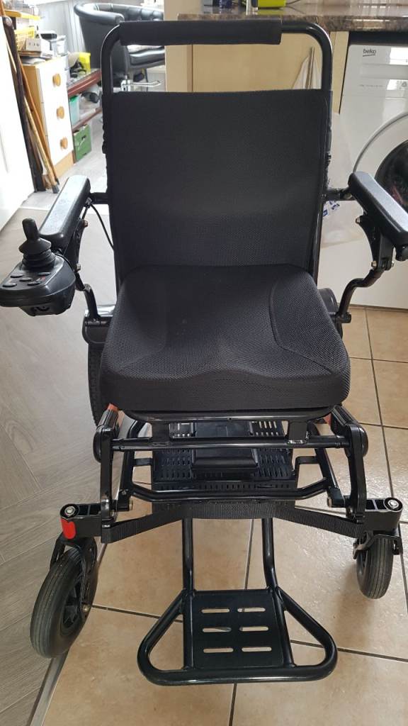 Electric wheelchair (Foldable and has a Brushless motor)