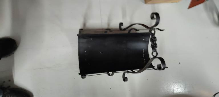 Black cast metal log basket 