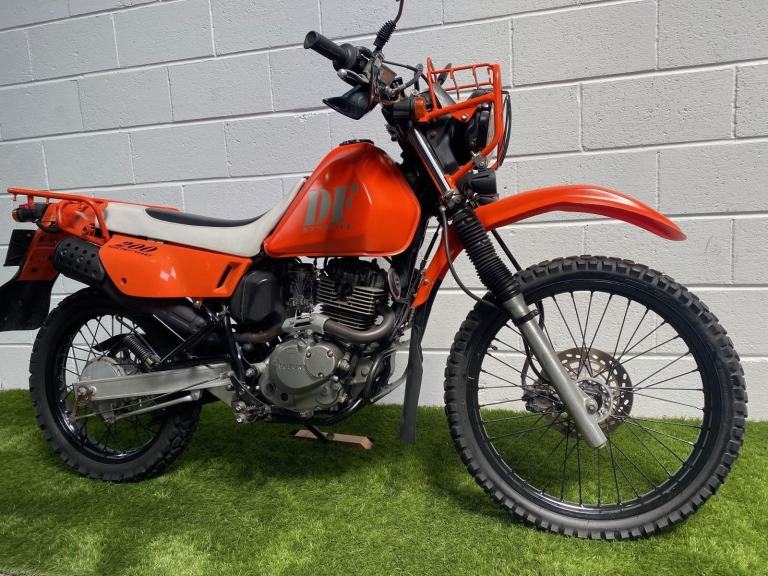 1998 JDM Suzuki DF200E enduro with large rack and headlight guard