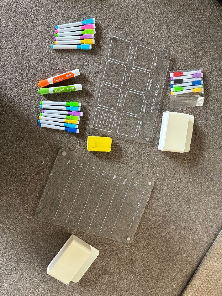 2 magnetic weekly planners, pen holders,eraser and pens
