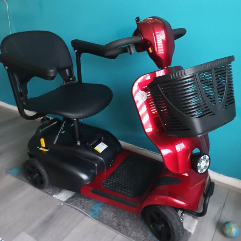 Red Mobility Scooter with Front Basket – Good Condition
