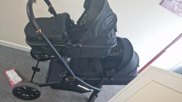 My babiie,Double pram with car seats.